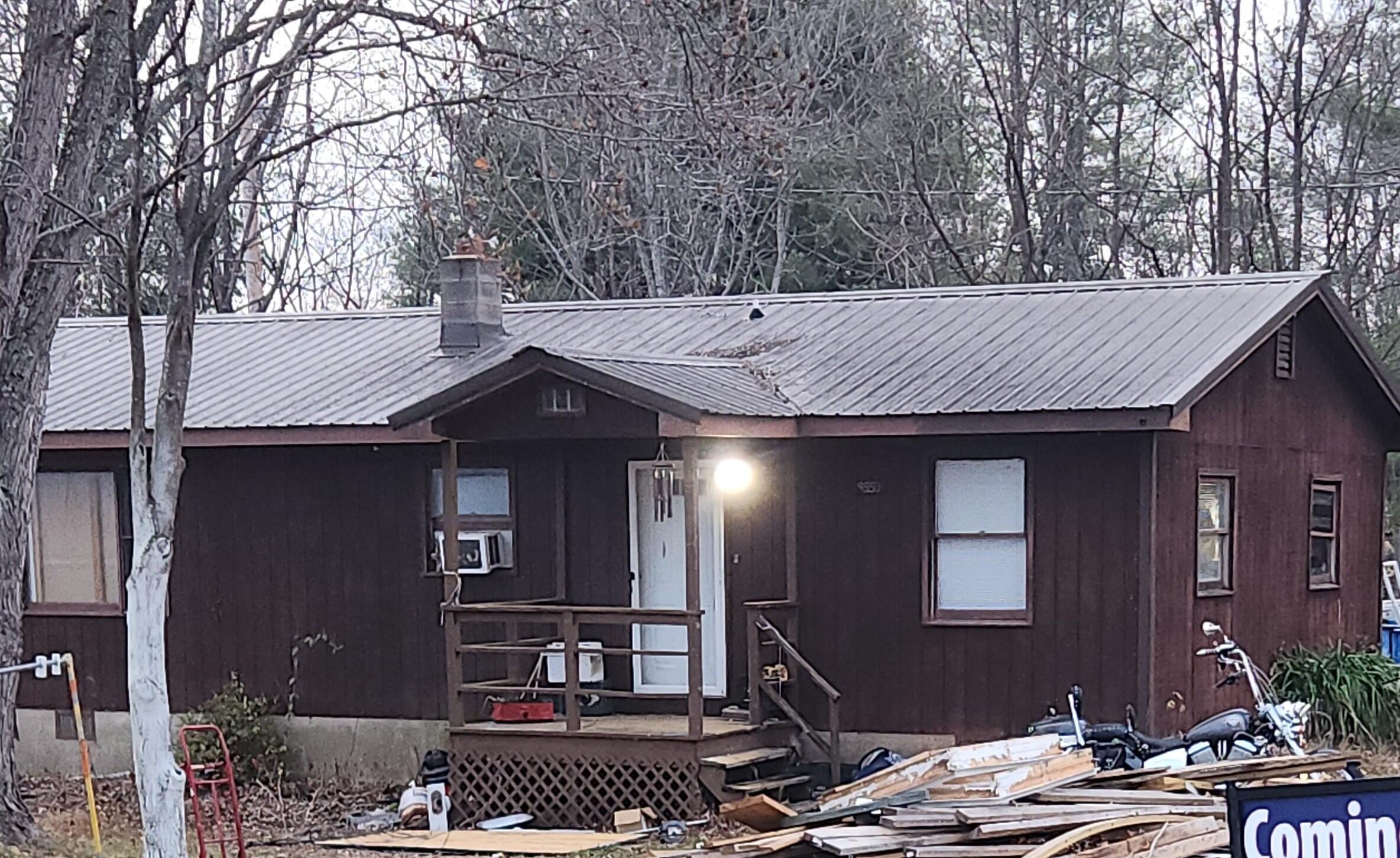 a view of house with outdoor space