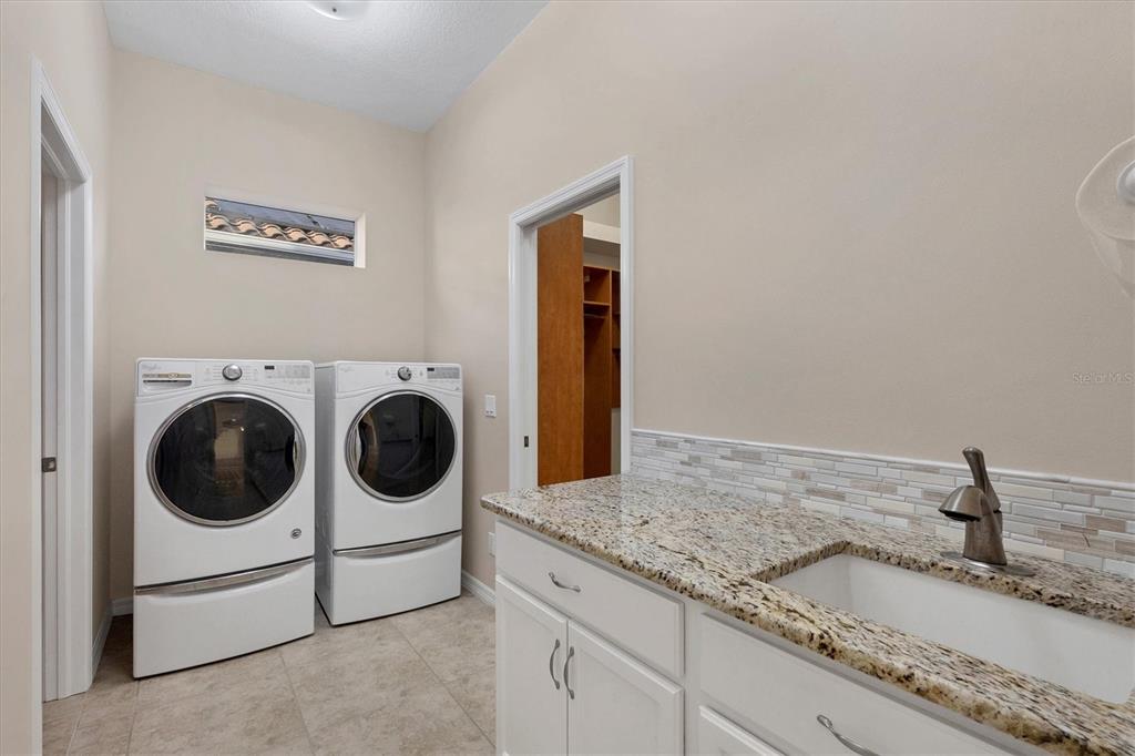2037 Silver Palm Road North Port, FL 34288 - Photo 25 of 43 LAUNDRY