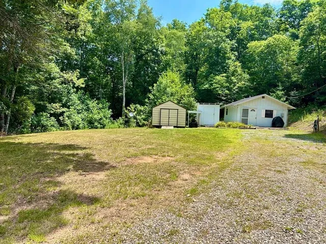 a house view with a outdoor space