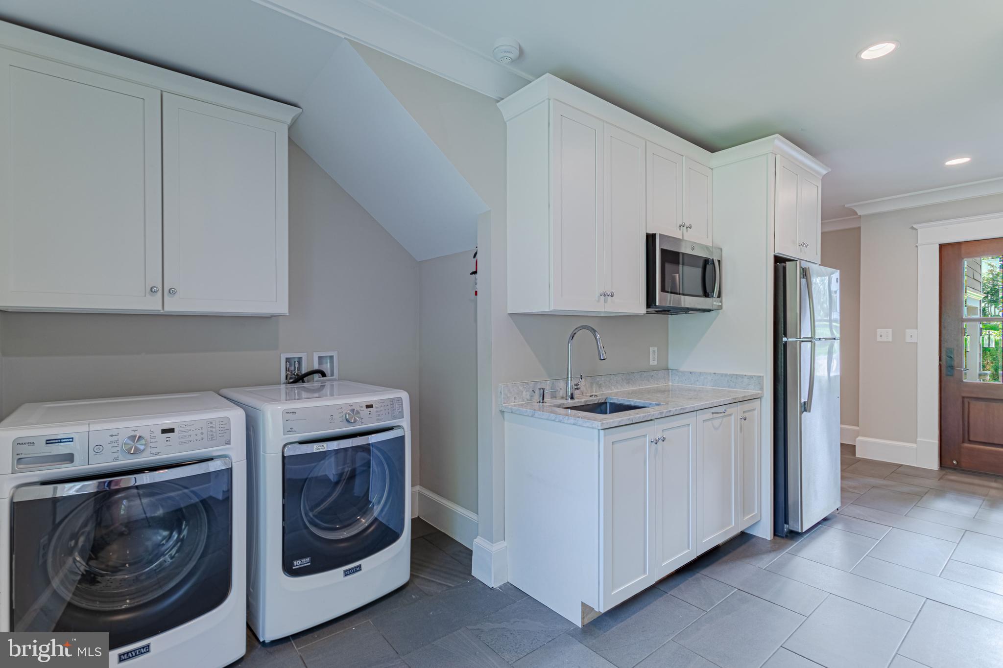 1478 Waggaman Circle McLean, VA 22101 - Photo 16 of 50 Butler's kitchen with additional washer/dryer