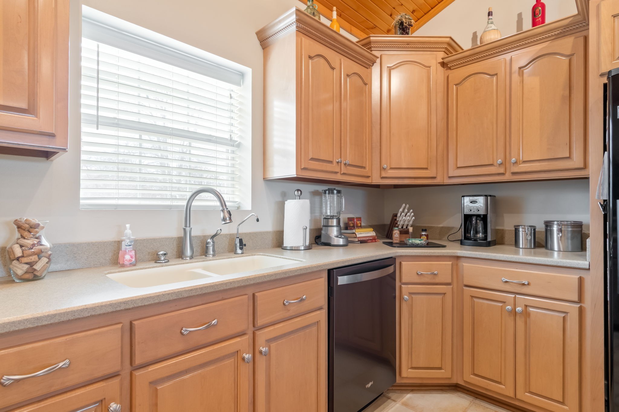 3100 Floyd Road Eagleville, TN 37060 - Photo 41 of 62 a kitchen with granite countertop a sink cabinets stainless steel appliances and a window