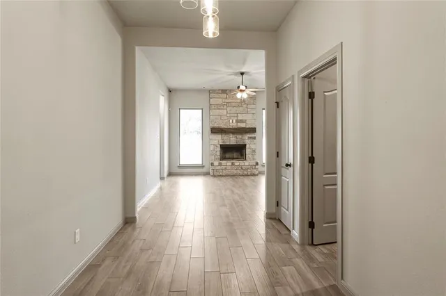 wooden floor in a gallery with a mirror