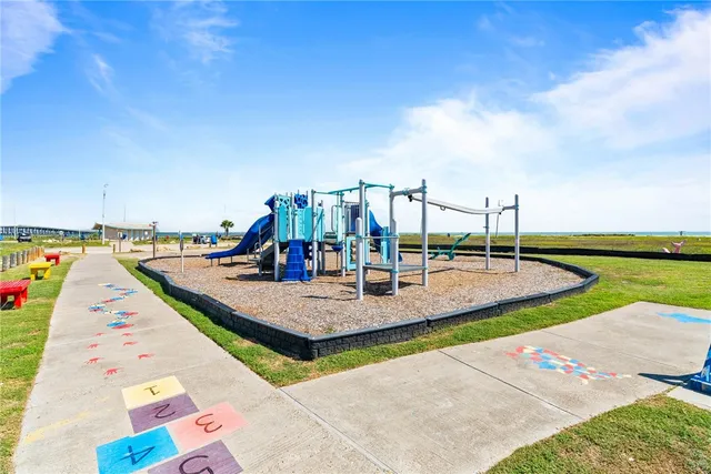 a view of swimming pool with chairs