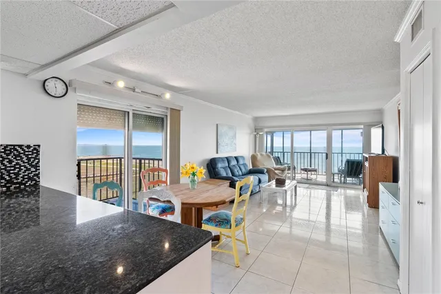 a view of a living room and dining room