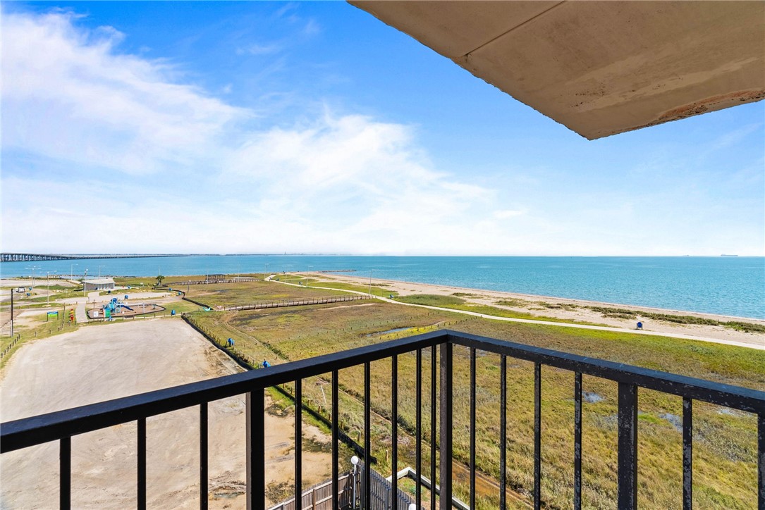 202 Reef Avenue, Unit 407 Corpus Christi, TX 78402 - Photo 7 of 32 Balcony by dining area with water views.