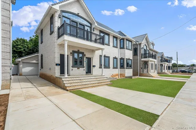 a view of a building with a yard