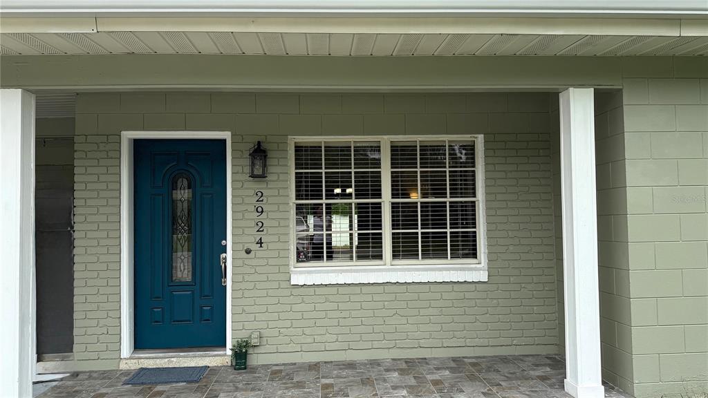 2924 Conway Gardens Road Orlando, FL 32806 - Photo 2 of 36 a view of front door