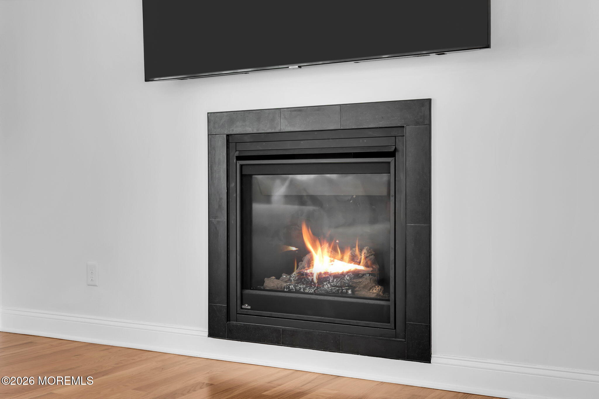 312 Beach Boulevard Forked River, NJ 08731 - Photo 11 of 40 a living room with a fireplace