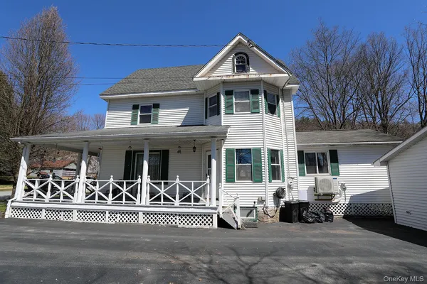 a view of a house with a patio