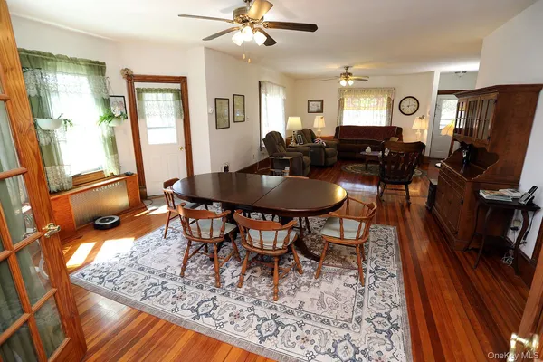 a view of a dining room with furniture