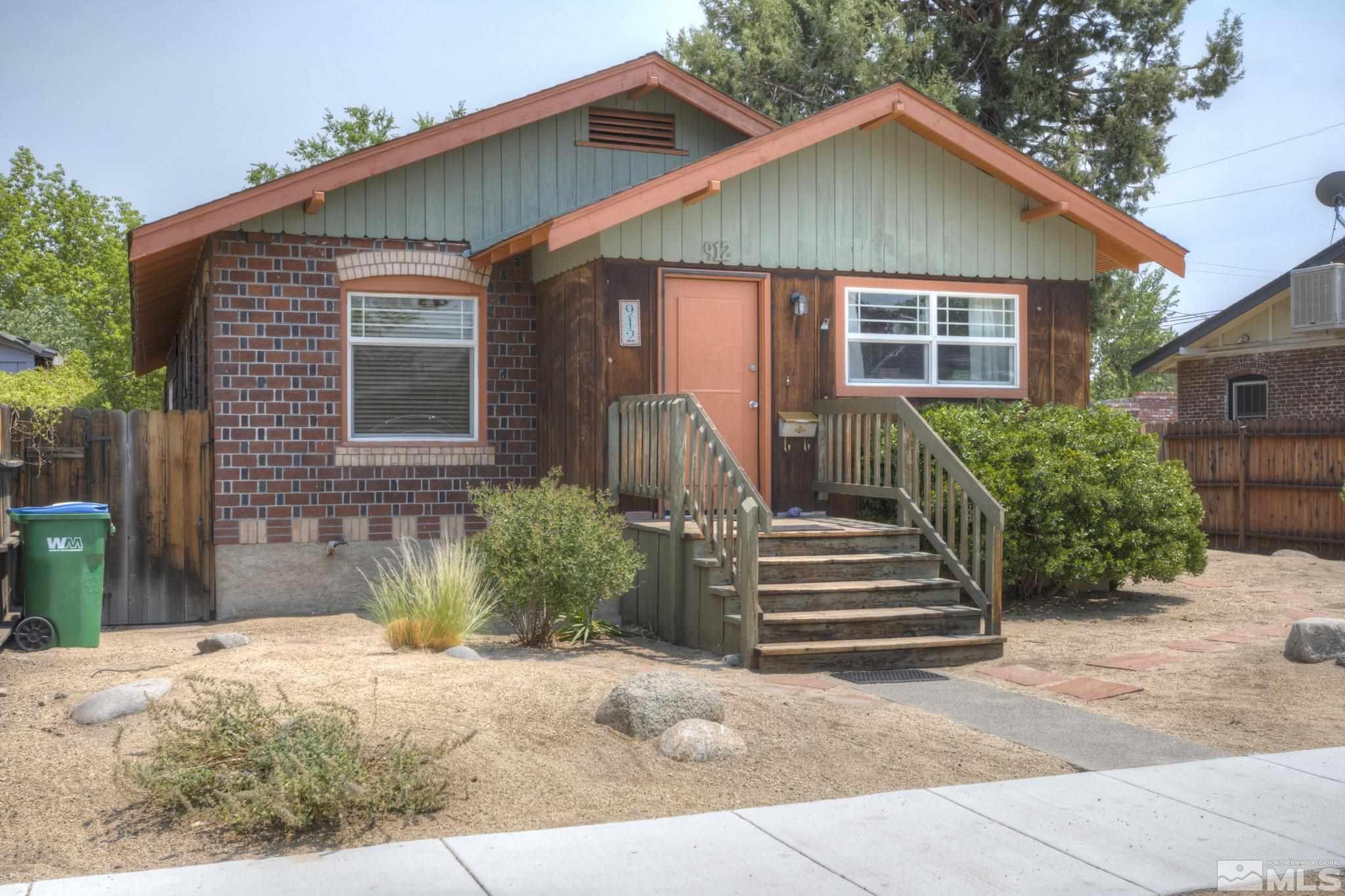 912 Ralston Street Reno, NV 89503 - Photo 1 of 36 a front view of a house with a yard