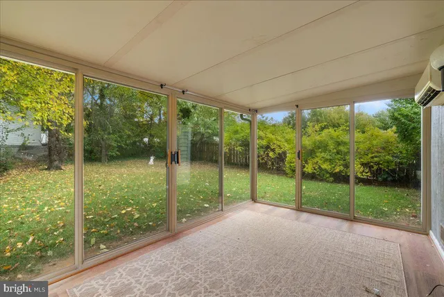 a view of backyard with green space