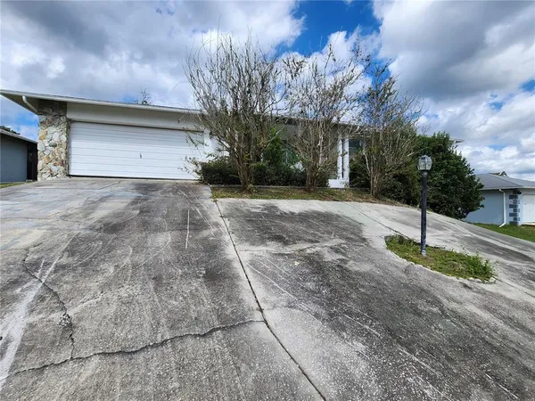 a house with trees in front of it