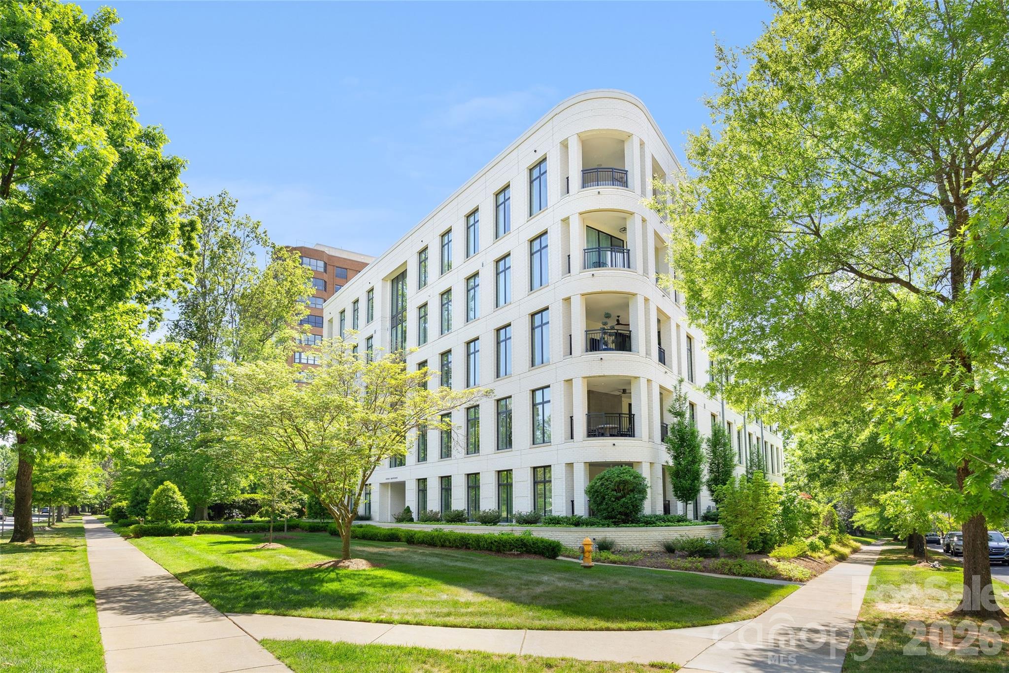 1500 Queens Road, Unit 104 Charlotte, NC 28207 - Photo 2 of 41 a front view of a building