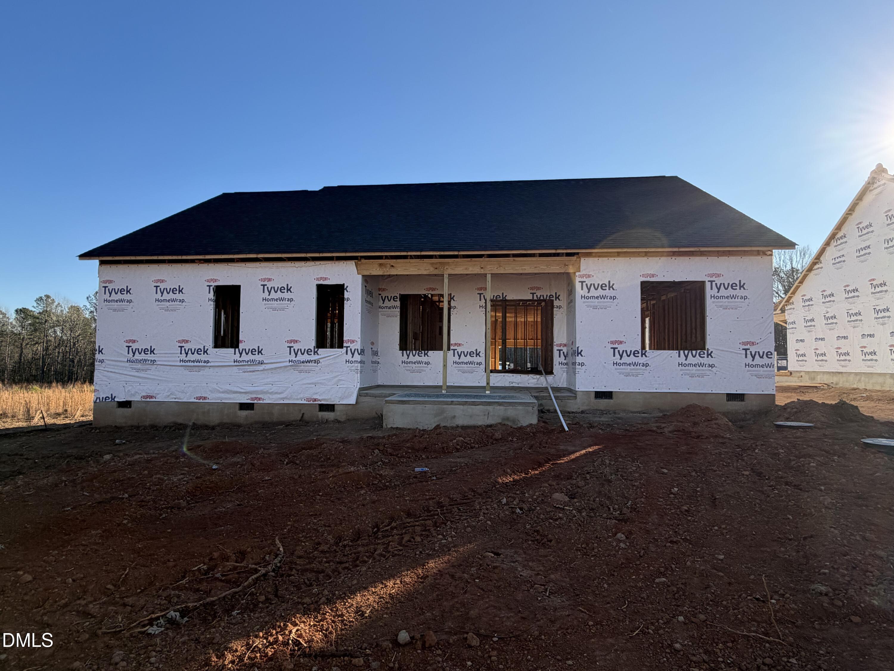 259 Seahawk Way Zebulon, NC 27597 - Photo 6 of 6 a front view of a house with garage