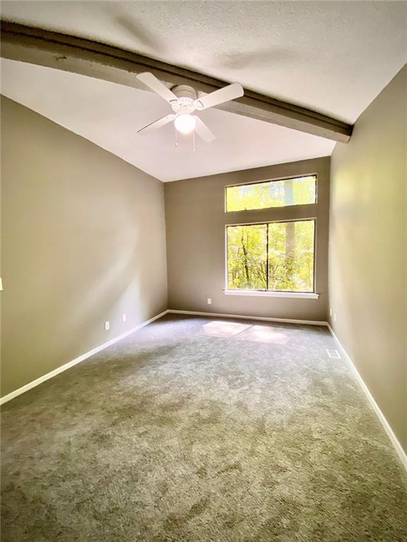5840 Par Four Court Lithonia, GA 30038 - Photo 20 of 27 an empty room with a window