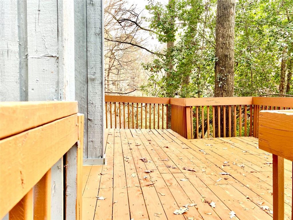 5840 Par Four Court Lithonia, GA 30038 - Photo 24 of 27 a bed sitting in a spacious bedroom next to a window