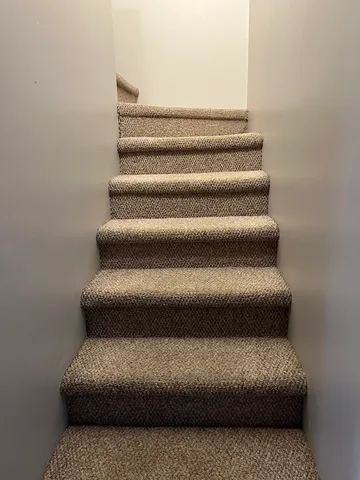 a living room with furniture and a book