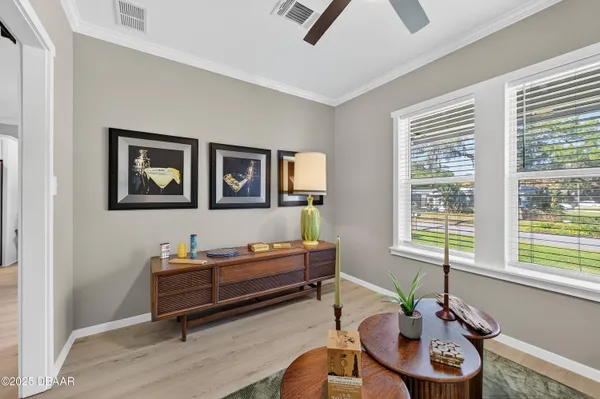 a living room with furniture and a window