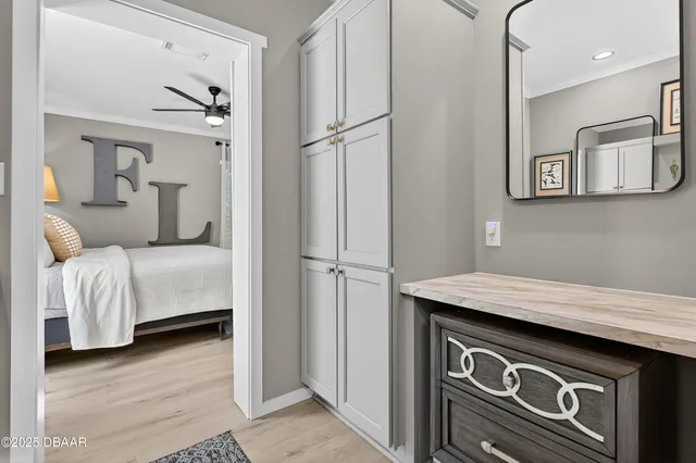 a kitchen with stainless steel appliances granite countertop a refrigerator and a stove