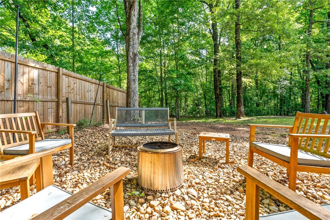 1284 Lee Road Salem, AL 36874 - Photo 23 of 24 This tranquil outdoor space offers a private retreat surrounded by lush greenery.