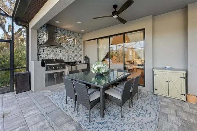 a bathroom with a toilet and a shower curtain