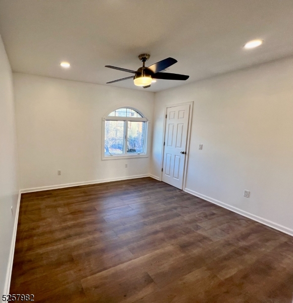 61 Mountainview Boulevard, Unit 4 Wayne, NJ 07470 - Photo 5 of 8 a view of an empty room with a window