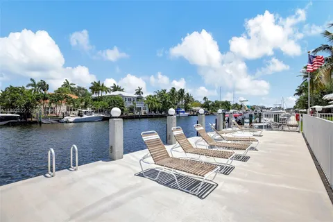 a view of a chair and table on the garden