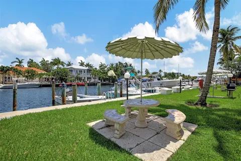 a view of a chair and table of the garden