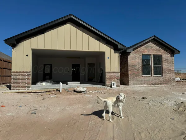 a front view of a house with patio