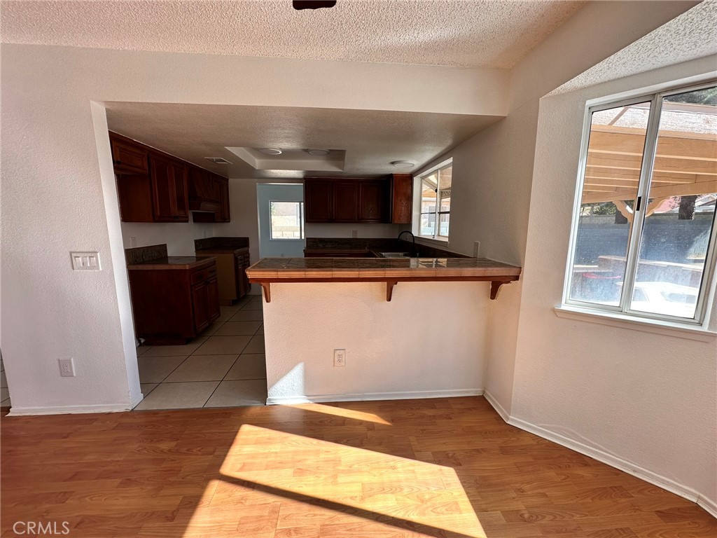 744 East Ave J11 Lancaster, CA 93535 - Photo 19 of 29 a view of living room with stainless steel appliances wooden floor and window