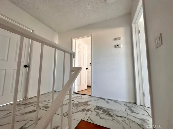 a view of an entryway with staircase