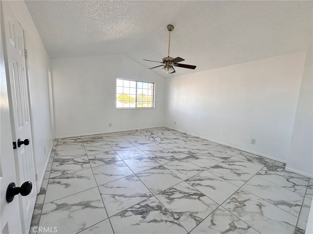744 East Ave J11 Lancaster, CA 93535 - Photo 25 of 29 a view of empty room with windows