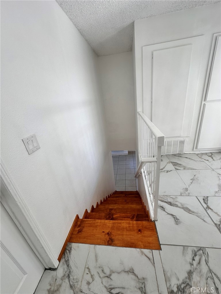 744 East Ave J11 Lancaster, CA 93535 - Photo 28 of 29 a bedroom with a bed and a window