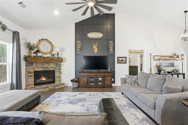 a view of balcony with wooden floor and outdoor seating