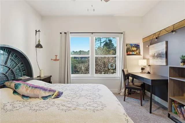 a view of an house with a yard