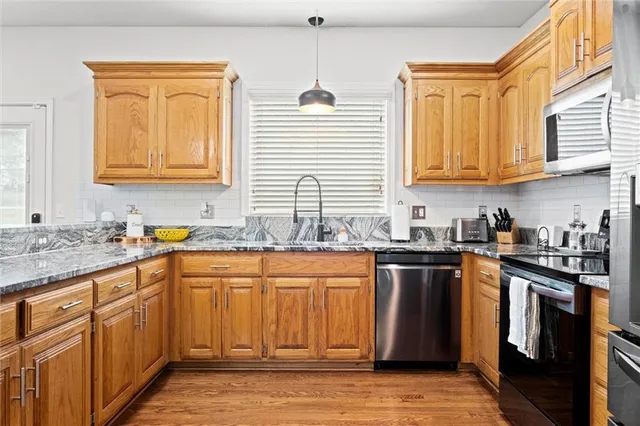 $559,000 | 5713 Widmer Road, Shawnee, KS 66216