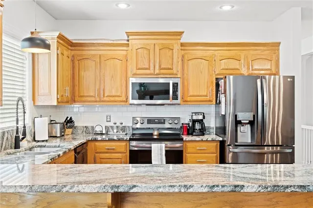 $559,000 | 5713 Widmer Road, Shawnee, KS 66216