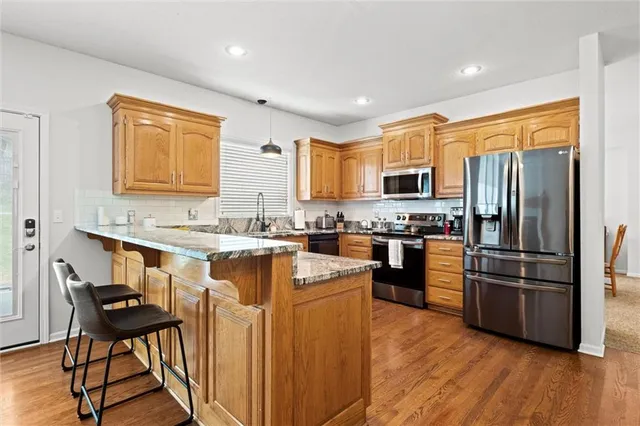 $569,000 | 5713 Widmer Road, Shawnee, KS 66216