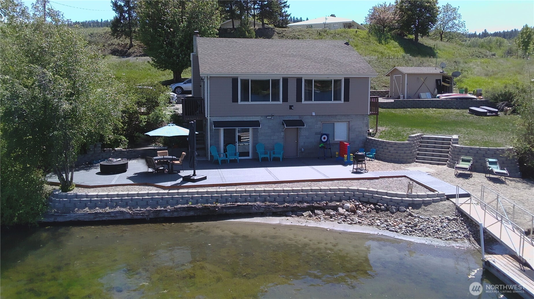 6 Marions Cove Road Republic, WA 99166 - Photo 1 of 33 a front view of a house with a yard