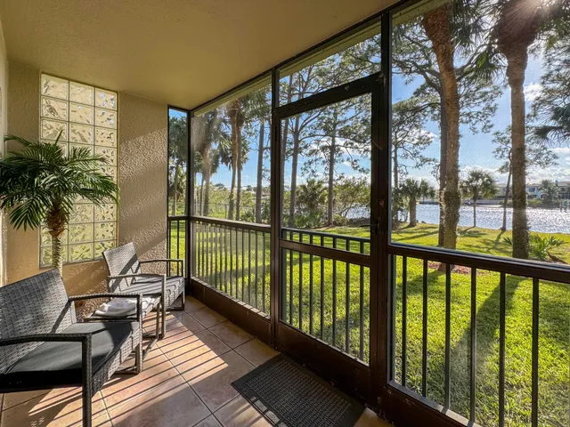 a view of balcony with furniture