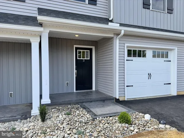 a front view of a house with a window