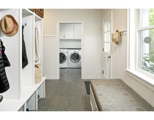 3 Alexandra Way Hingham, MA 02043 - Photo 16 of 30 a bathroom with a sink a mirror a washer and dryer