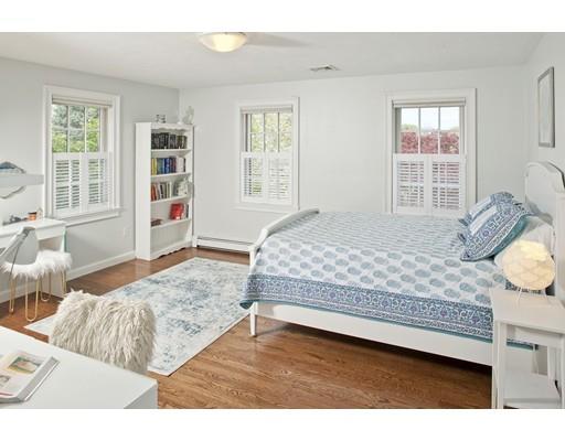 3 Alexandra Way Hingham, MA 02043 - Photo 18 of 30 a bedroom with a bed and wooden floor