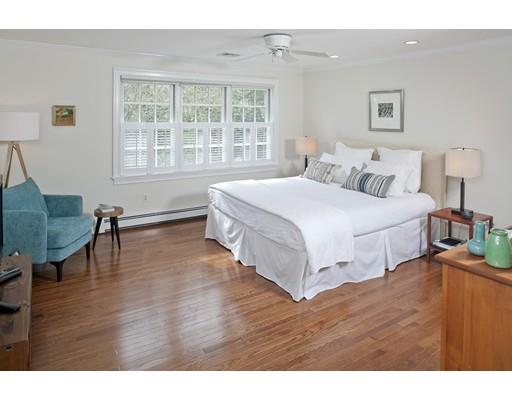 3 Alexandra Way Hingham, MA 02043 - Photo 21 of 30 a bedroom with a bed and wooden floor