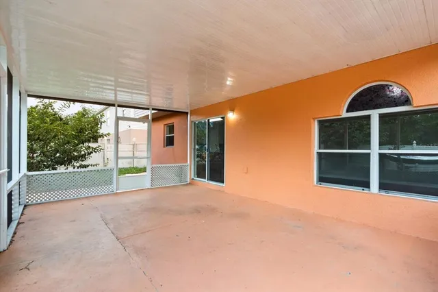 a view of an empty room with a balcony
