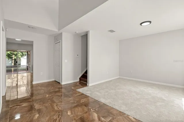 an empty room with windows