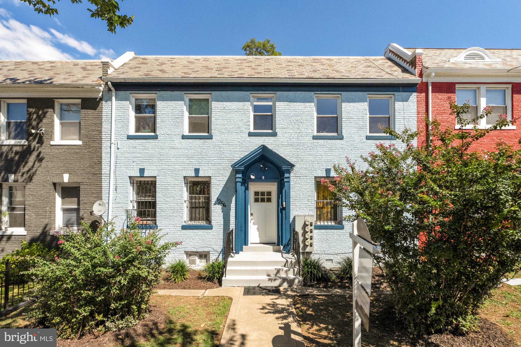 1254 Simms Place Northeast Washington, DC 20002 - Photo 1 of 21 a front view of a house with garden