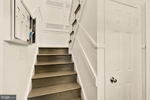a view of staircase with white walls and white walls