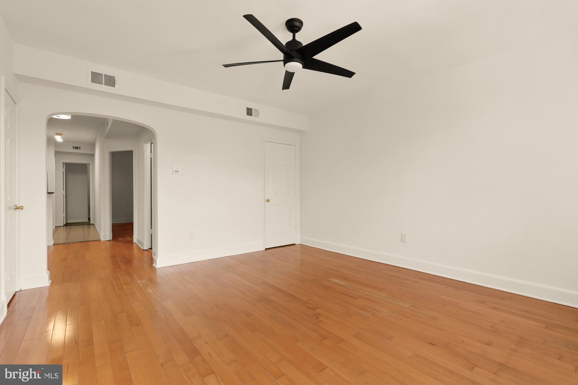 1254 Simms Place Northeast Washington, DC 20002 - Photo 6 of 21 wooden floor in an empty room